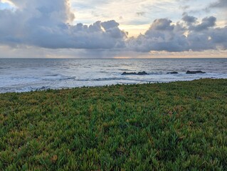 Half Moon Bay coastline, sunset over the sea, storm over the sea, clouds over the sea, California coast, pacific ocean coastline, breathtaking ocean view, west coast, view from the cliffs