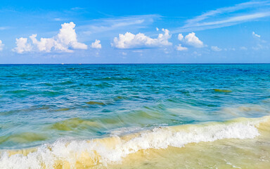 Tropical mexican beach clear turquoise water Playa del Carmen Mexico.