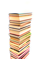 stack of books against a white background