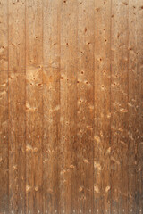A texture of brown boards with knots and resin painted with impregnation for wood