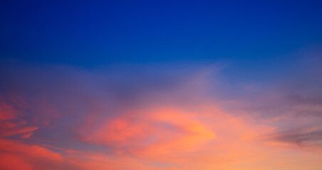 Clouds and orange sky,Real amazing panoramic sunrise or sunset sky with gentle colorful clouds. Long panorama, crop it
