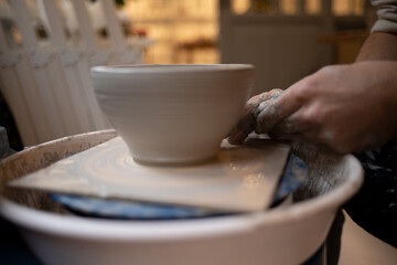 ceramic bowl on a potter's wheel