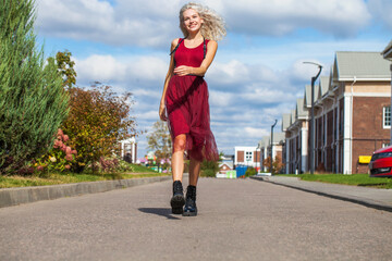 Young beautiful girl walking on the street