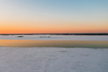 Fototapeta na wymiar Winter frozen Volga river 