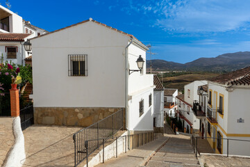 Walking on white cozy streets in Ronda, Spain on October 23, 2022