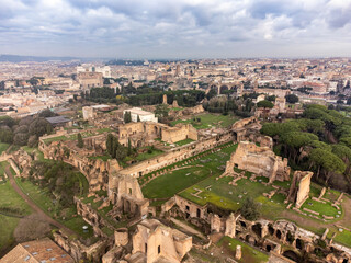 Fototapeta na wymiar Aerial view over Rome showing the Roman Forum, the buildings on Palatine Hill and the city