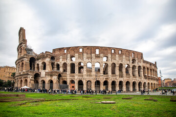 Naklejka na ściany i meble Roman Colosseum from outside in cloudy day, in Rome, in Italy