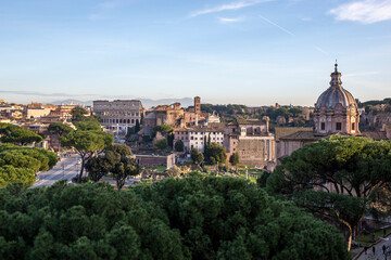 Fototapeta na wymiar View over Rome from the Forum with the Colosseum in the background