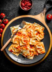 Ravioli with veal and tomato sauce.