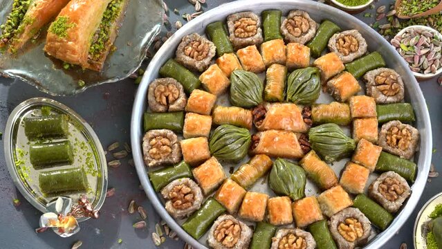 Traditional turkish baklava pistachio pastry. Dilberdudagi, ozel kesim baklava, cikolatali baklava, fistikli baklava, katmer, fistikli kadayif, kattafi, fistik sarma, soguk baklava, midye baklava, cev