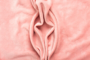 Pink soft fabric shaped as female genital organs, vulva and labia, vagina concept - obrazy, fototapety, plakaty