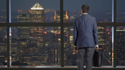 Business Man look from his office window, sky-scraper view