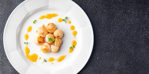 sea scallops fried seafood healthy meal food snack on the table copy space food background rustic top view