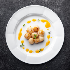 sea scallops fried seafood healthy meal food snack on the table copy space food background rustic top view