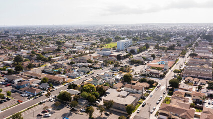 Daytime aerial view of housing in the urban core of Bellflower, California, USA.