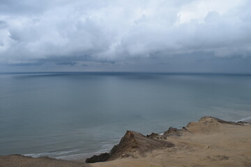 View of the approaching rain over the North Sea from Rubjerg Knude Lighthouse; Denmark; North Judeland
