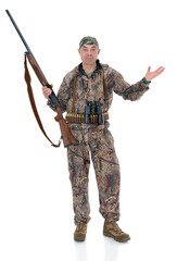 Вuck hunter with a rifle and binoculars shows that he did not hunt anything. Fifty-year-old man in hunting uniform standing in studio, isolated on white background. Full length portrait of a hunter.
