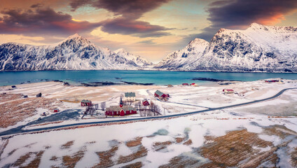 Extraordinary spring scene of Lofoten Islands. View from flying drone of Flakstad village with...
