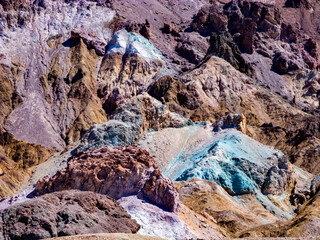 slopes at Artists Palette in Death Valley, California. Various mineral pigments have colored the volcanic deposits found here