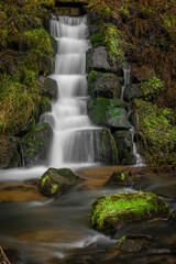 Obraz premium Feldaist river in valley near Rainbach im Muhlkreis in winter day with waterfall