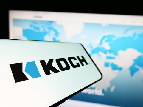 Stuttgart, Germany - 01-11-2023: Cellphone with logo of American company Koch Industries Inc. on screen in front of business website. Focus on center-left of phone display.