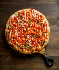 Mexican pizza on the cutting Board.