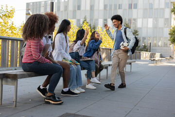 Fototapeta premium student friends sitting in the campus garden