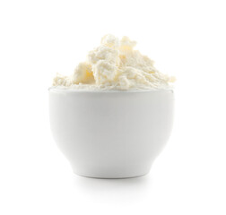 Bowl of tasty cream cheese on white background