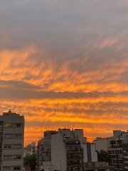 view of rooftops of Buenos Aires, Argentina, different colors, height, surroundings, during the sunset.