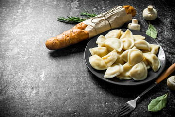 Dumplings with baguette and Bay leaf.