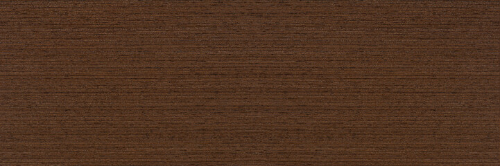 Texture of wenge wood. Dark brown wood for furniture or flooring. Close-up of a Wenge wooden plank,...