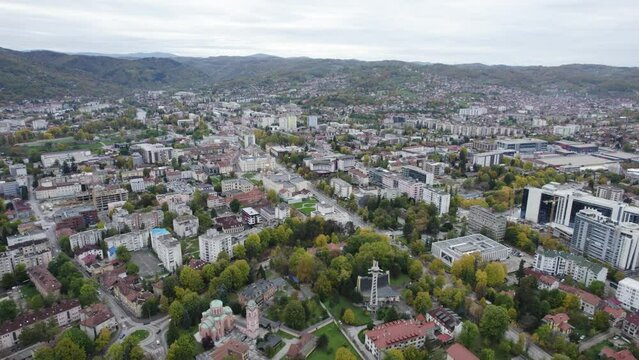 Aerial view of city Banja Luka in Bosnia and Herzegovina, city center, parks and residential houses, river Vrbas, old fortress