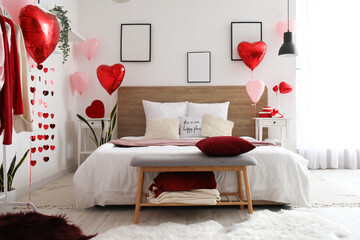 Interior of bedroom with gifts and balloons for Valentine's Day