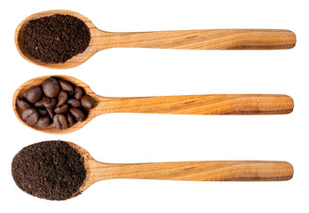Three wooden spoons with ground coffee and whole beans on an isolated background.