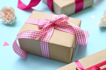 Gifts for Valentine's Day celebration on color background, closeup