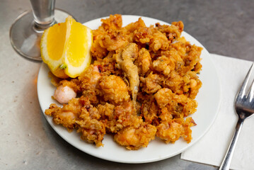 Deliciously fried Andalusian baby squid in batter of tempera flour