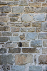 Handmade wall texture with stones and cement, Appennini, Italy