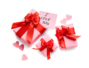 Gifts, paper hearts and sticky note with text I LOVE YOU on white background. Valentine's Day celebration