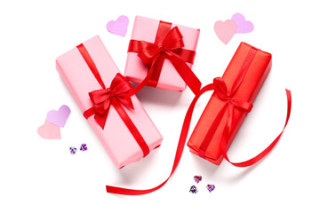 Gift boxes with decor on white background. Valentine's Day celebration