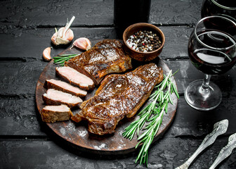 Grilled beef steak with red wine.
