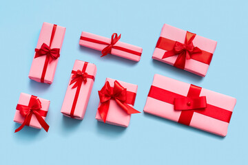 Set of different gift boxes on color background. Valentine's Day celebration