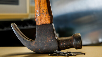 Close up from metal hammer with nails