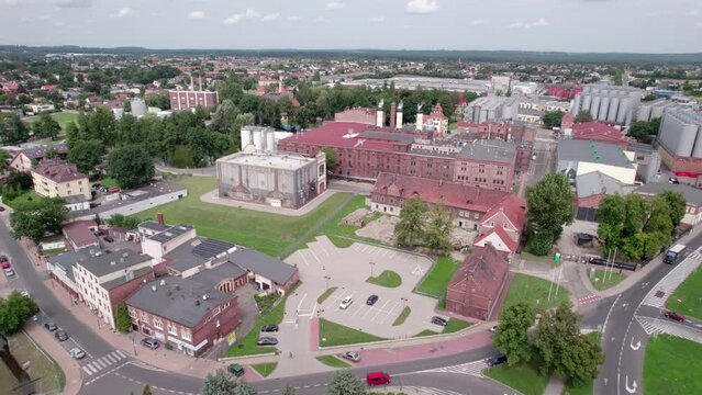Brewery factory in Tychy, Poland from an aerial view on a beautiful sunny day. A giant beer brewing industry located in the Silesian Voivodeship.