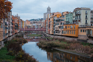 Naklejka na ściany i meble Girona city skyline with famous Cathedral landmark on a cloudy winter day