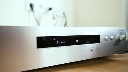 Now initializing dot matrix display message on new HI-FI network audio player with Hi-Res Audio during first setup wi-fi message scan percentage 