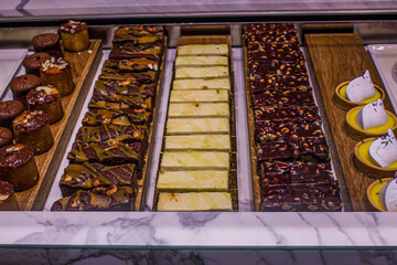 Selection of Rich Desserts, Including Cakes, Puddings, and Tarts, at a Patisserie in Reykjavik, Iceland
