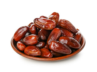 Plate with dried dates for Ramadan on white background