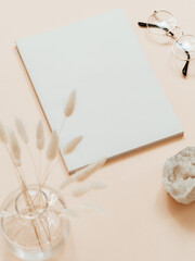 Empty blank white magazine or catalog cover layout, vase, glasses and white crystal