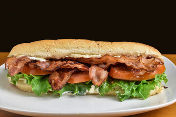 bacon lettuce  and tomato  in a sub  sandwich