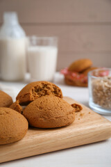 Fototapeta na wymiar Delicious oatmeal cookies on white table, closeup